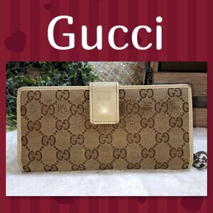 Authentic Gucci GG Canvas and Leather Wallet